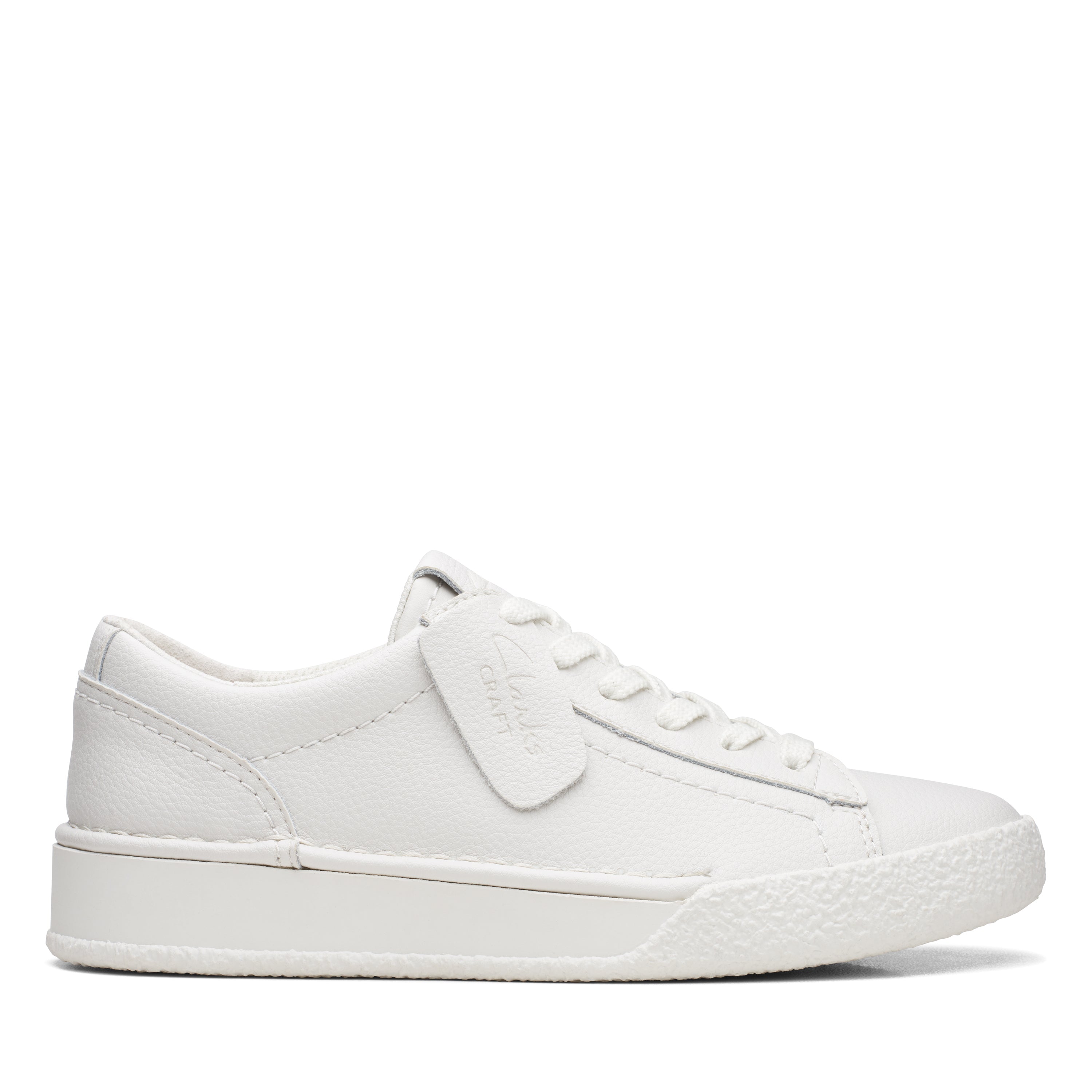 White leather slip on sale on trainers womens